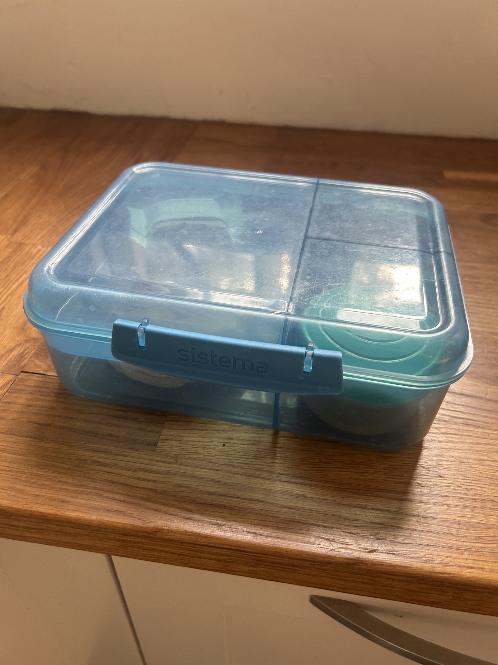 Sistema Bento Box lunchbox, blue, closed on a kitchen counter