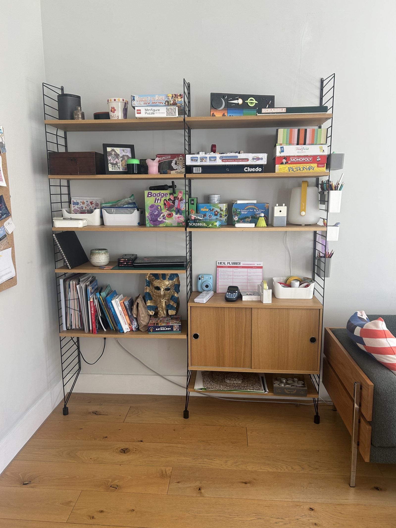 String shelving unit in the kitchen diner